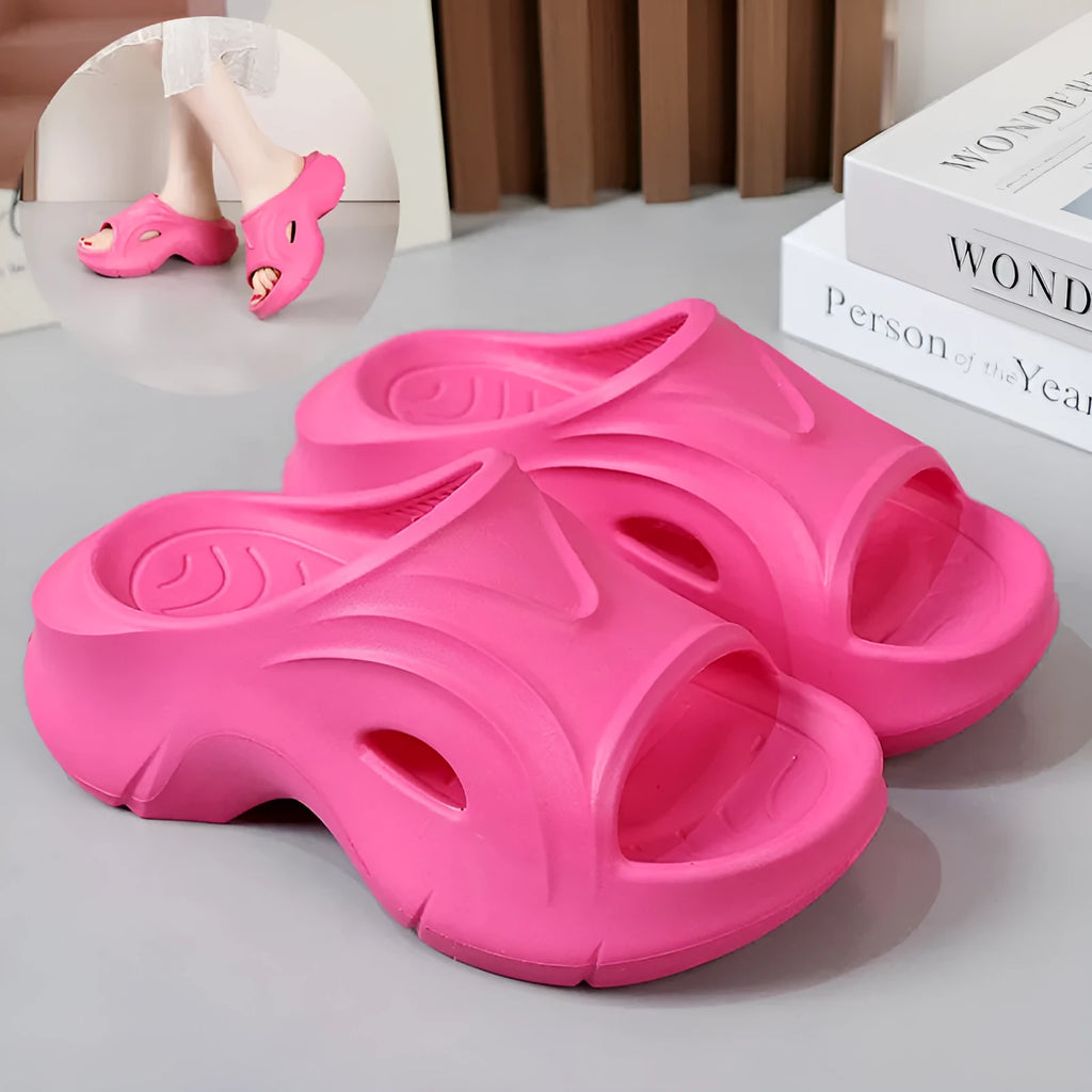 Women's thick-soled beach slippers in white, black, and rose red colours with EVA construction