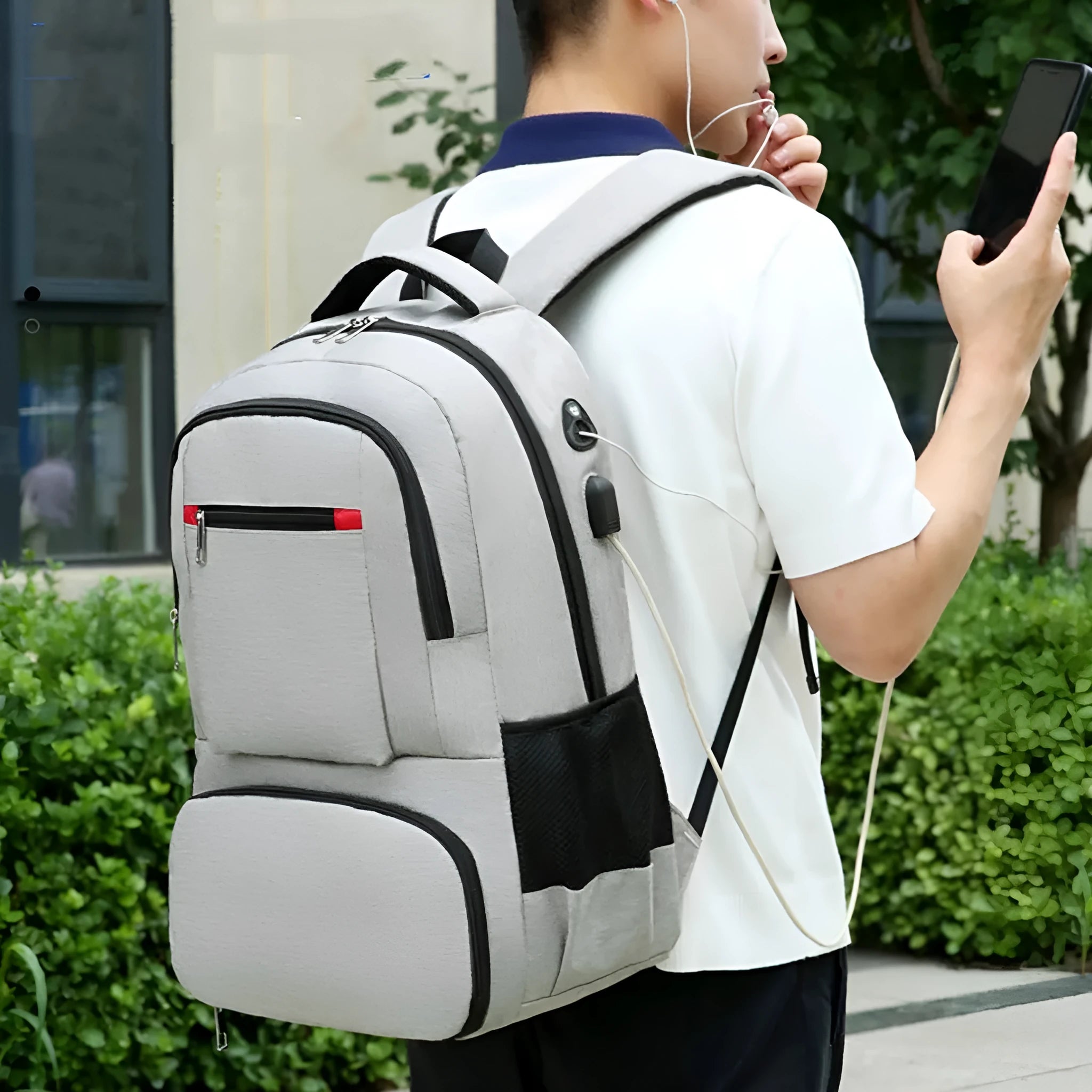 Light grey Oxford cloth insulated backpack with curved shoulder straps and dry wet separation compartments