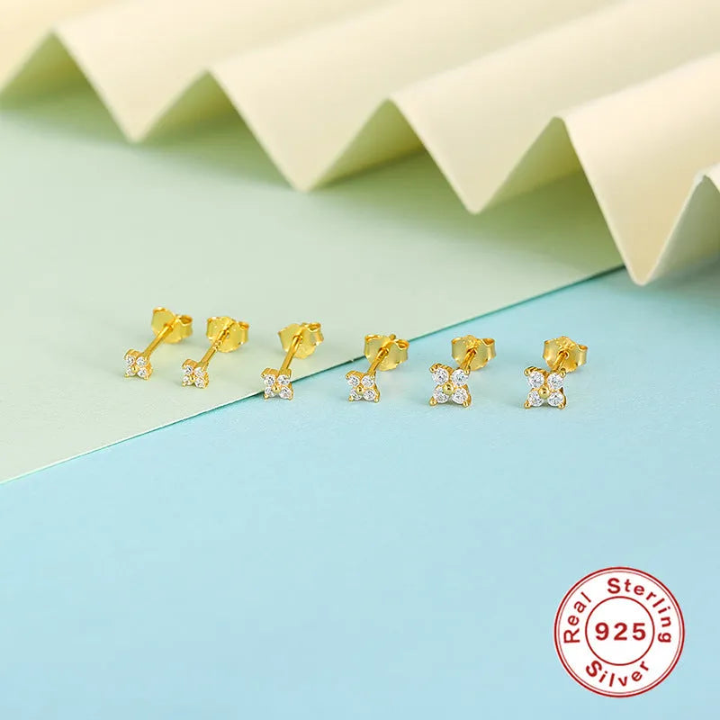S925 sterling silver stud earrings with a geometric petal crystal flower design in gold or platinum finish.