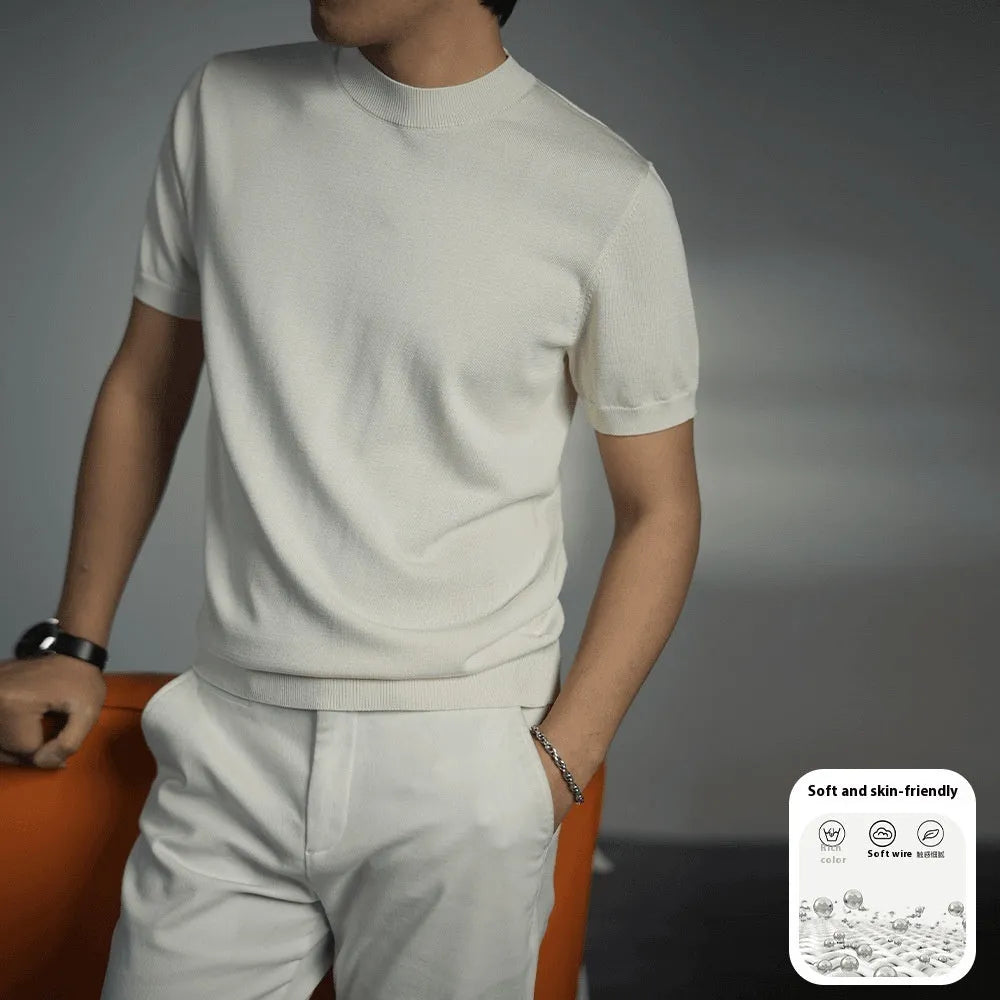 Men's solid colour knitted T-shirt with round neck and short sleeves on a grey background.