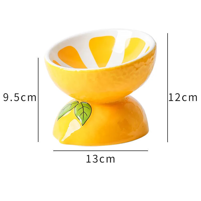 Ceramic raised cat bowl with tilted design and slip-resistant base for food and water feeding