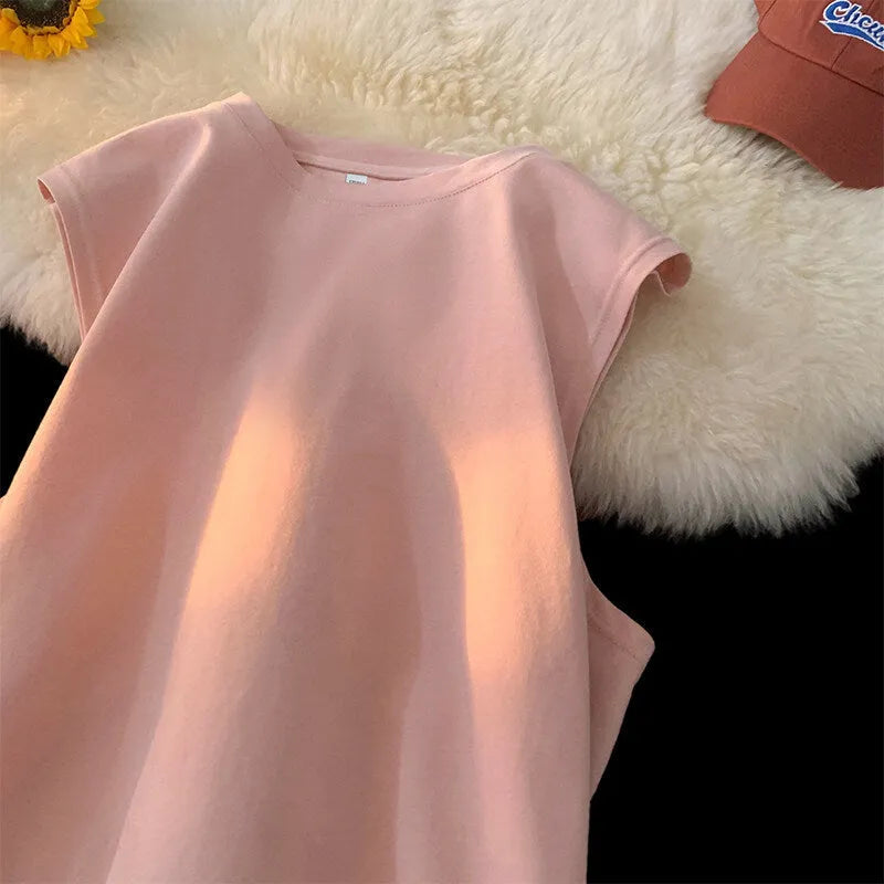 Men's loose solid colour cotton tank top on hanger showing straight hem design