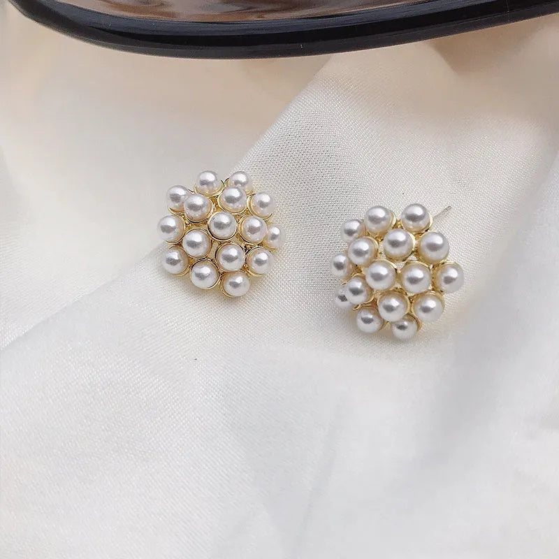 Korean-style pineapple starfish pearl earrings in gold, silver, pearl flower, and starfish pearl electroplated alloy.