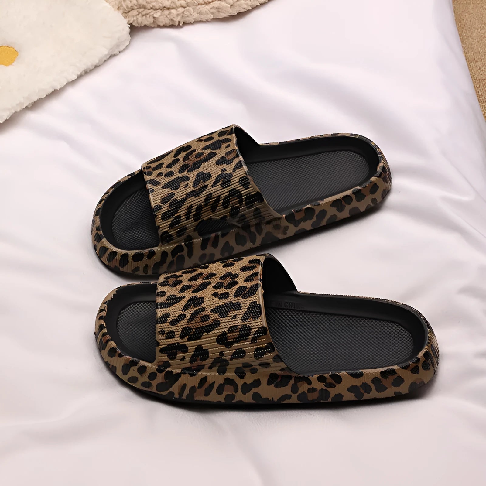 Women's leopard print EVA slippers with thick sole, shown in multiple colour variants.
