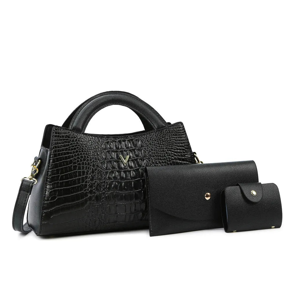 Women's black crocodile pattern PU leather crossbody handbag showing square shape and single shoulder strap.