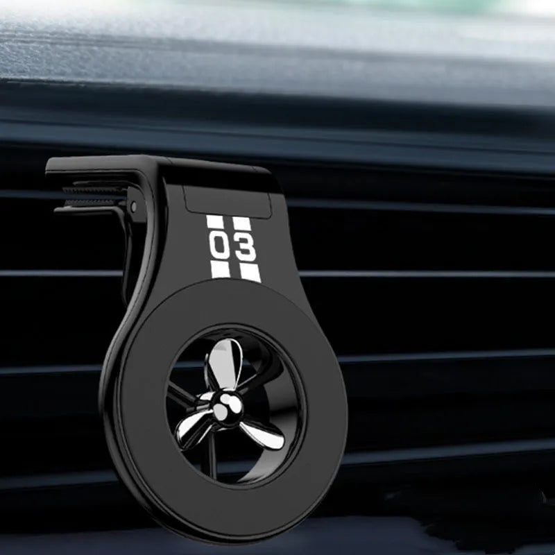 Magnetic car phone holder with fragrance slices attached to car air vent