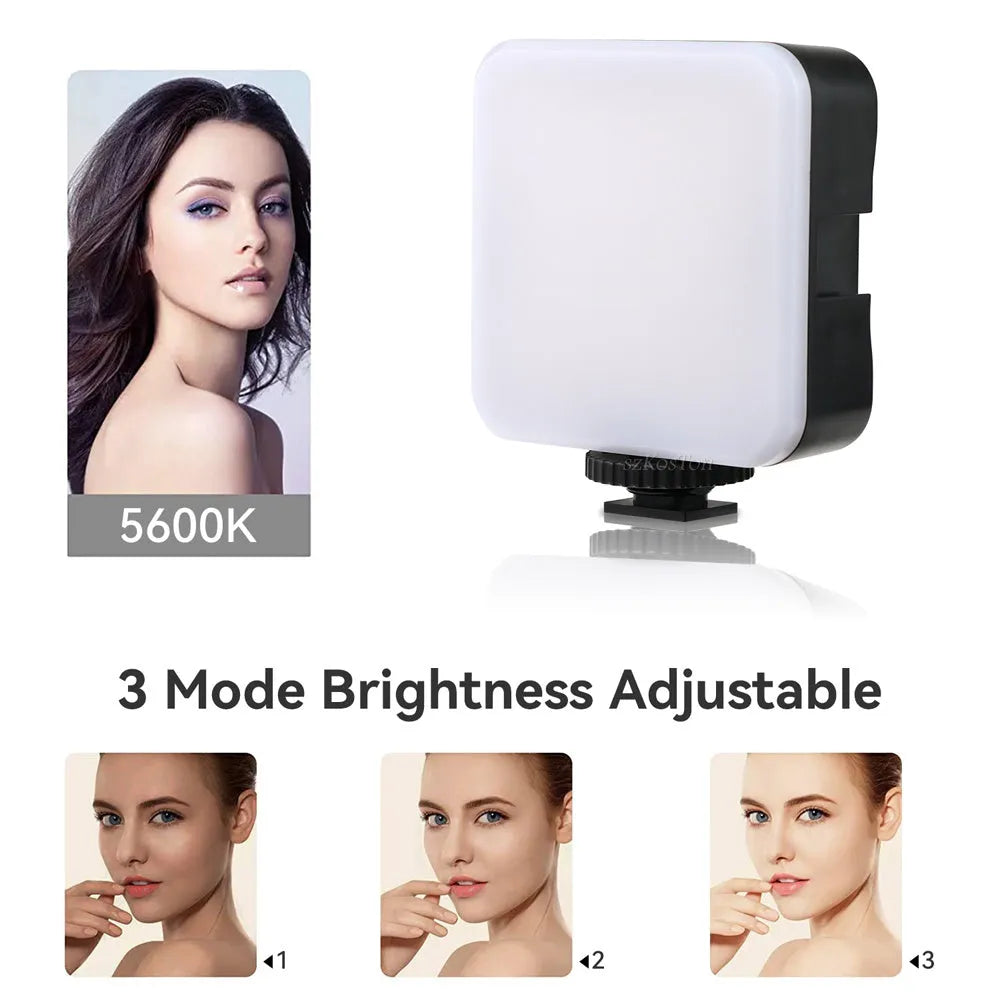 LED mini square universal camera flash on a pocket tripod, showing compact size and rotatable flash head.