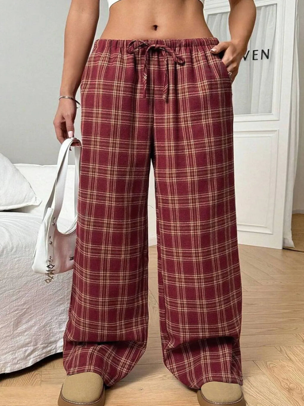 Women's red casual trousers with drawstring waist and plaid pockets in loose fit