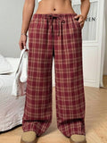 Women's red casual trousers with drawstring waist and plaid pockets in loose fit