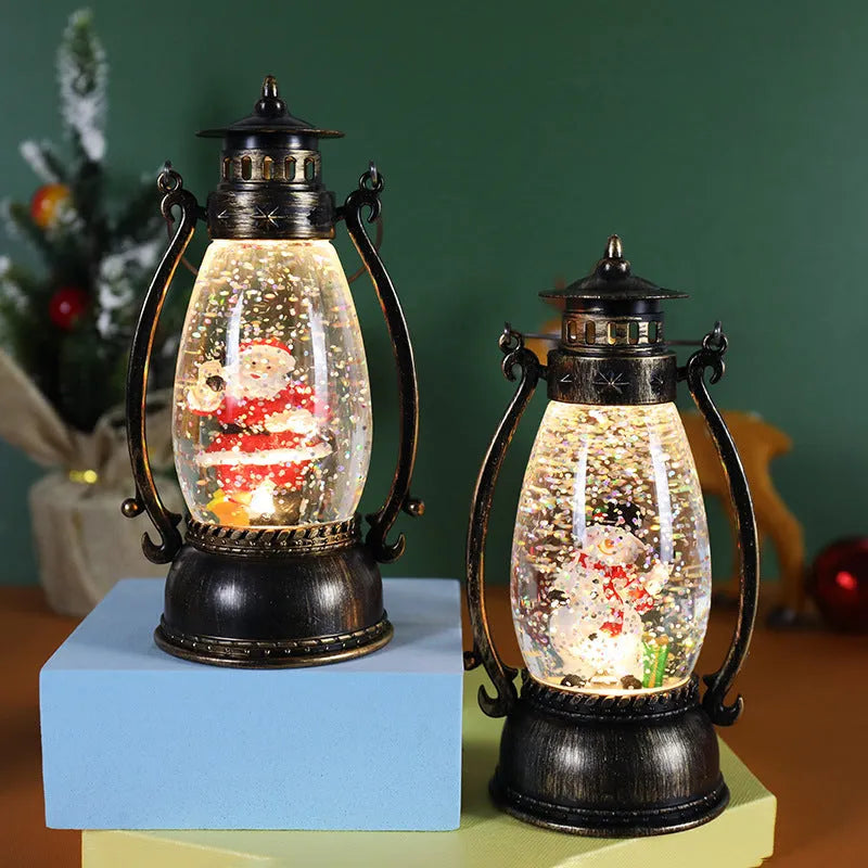 Portable crystal ball oil lamp Christmas ornament showing light-emitting snowman or elderly figure design on a desk.