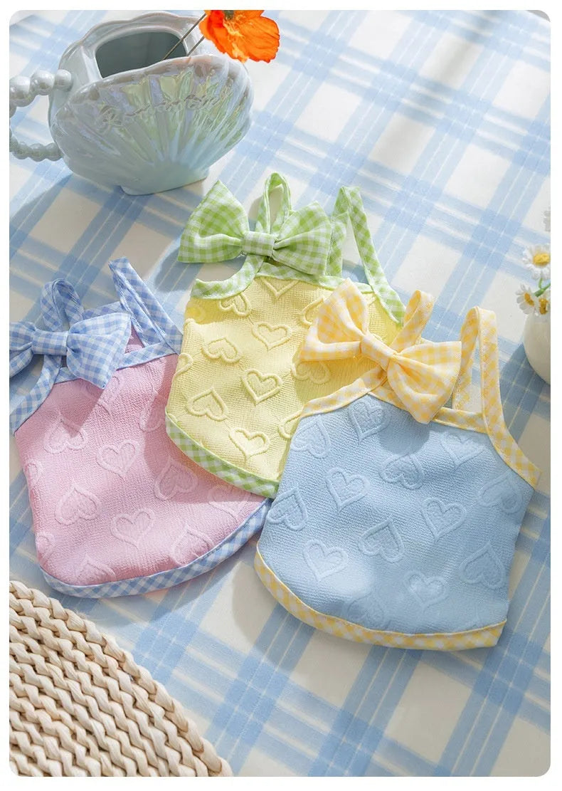 Small dog vest with heart texture and bow suspenders in blue, pink, or yellow with elastic sides