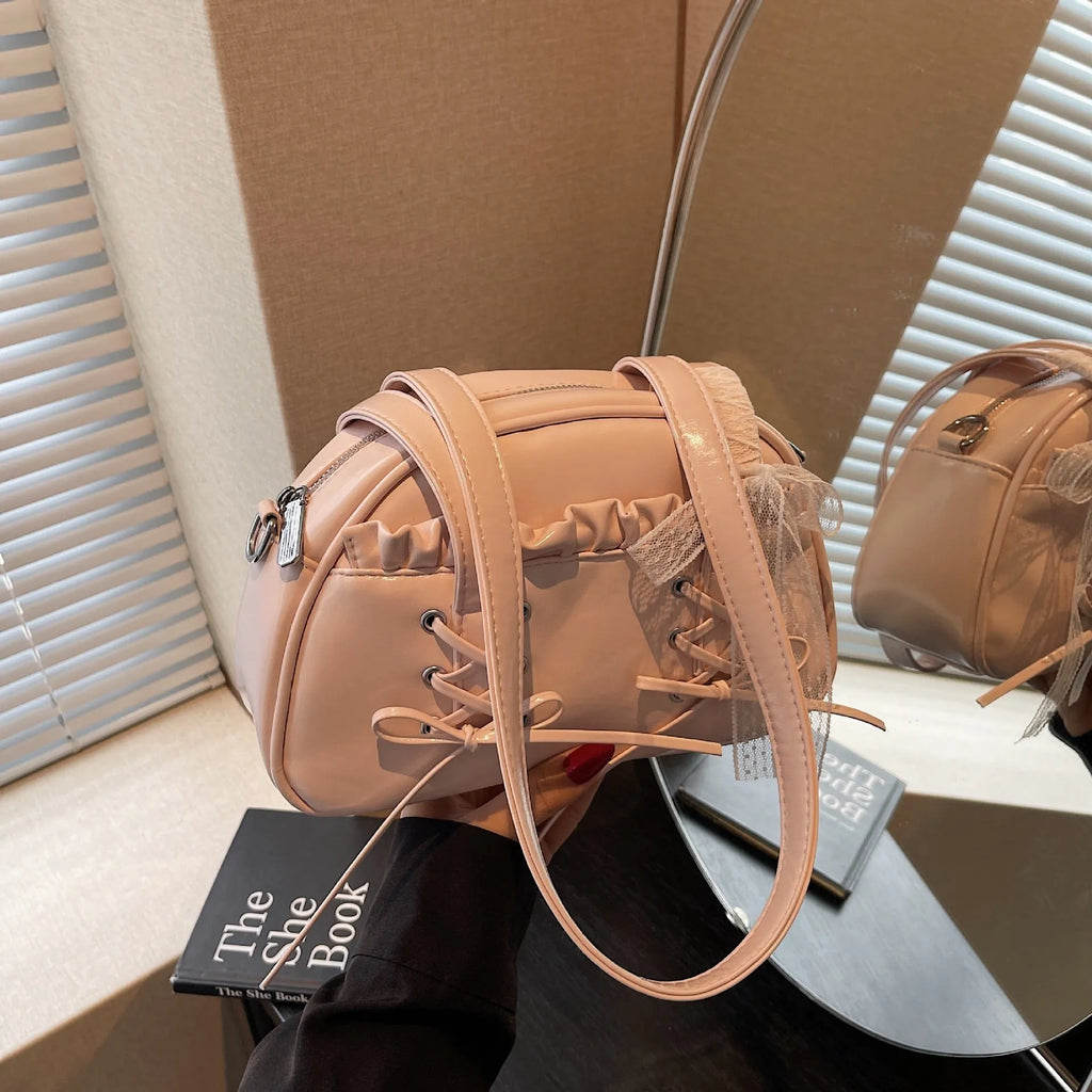 Women's casual PU shoulder handbag with a bandage bow and phone compartment in multiple colour options.