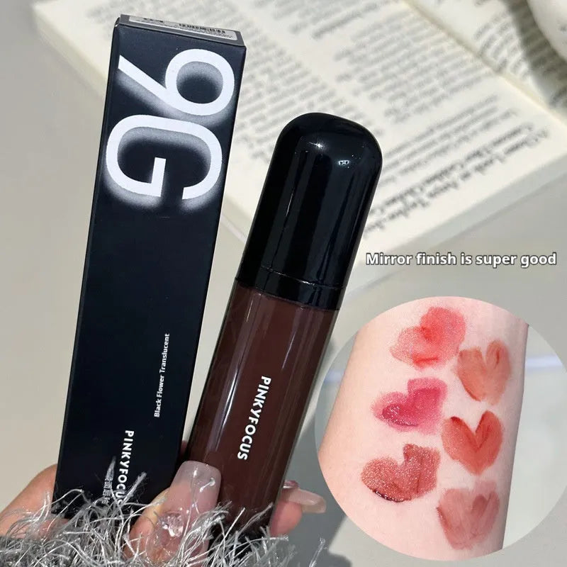 Black glossy mirror lip lacquer in one of six matte colour options: tomato, orange brown, brown, rose, red, or sweet potato.