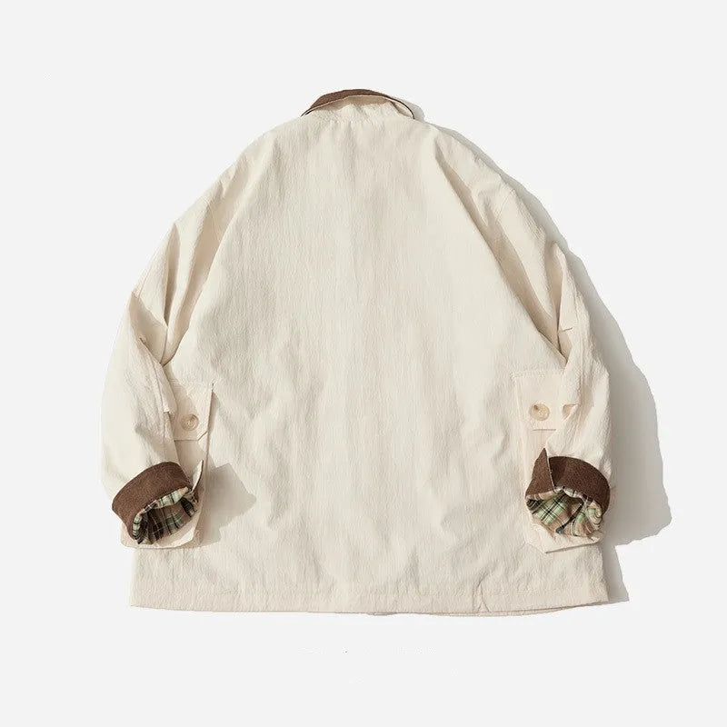 Green and apricot contrast colour casual jacket with side seam pockets on mannequin