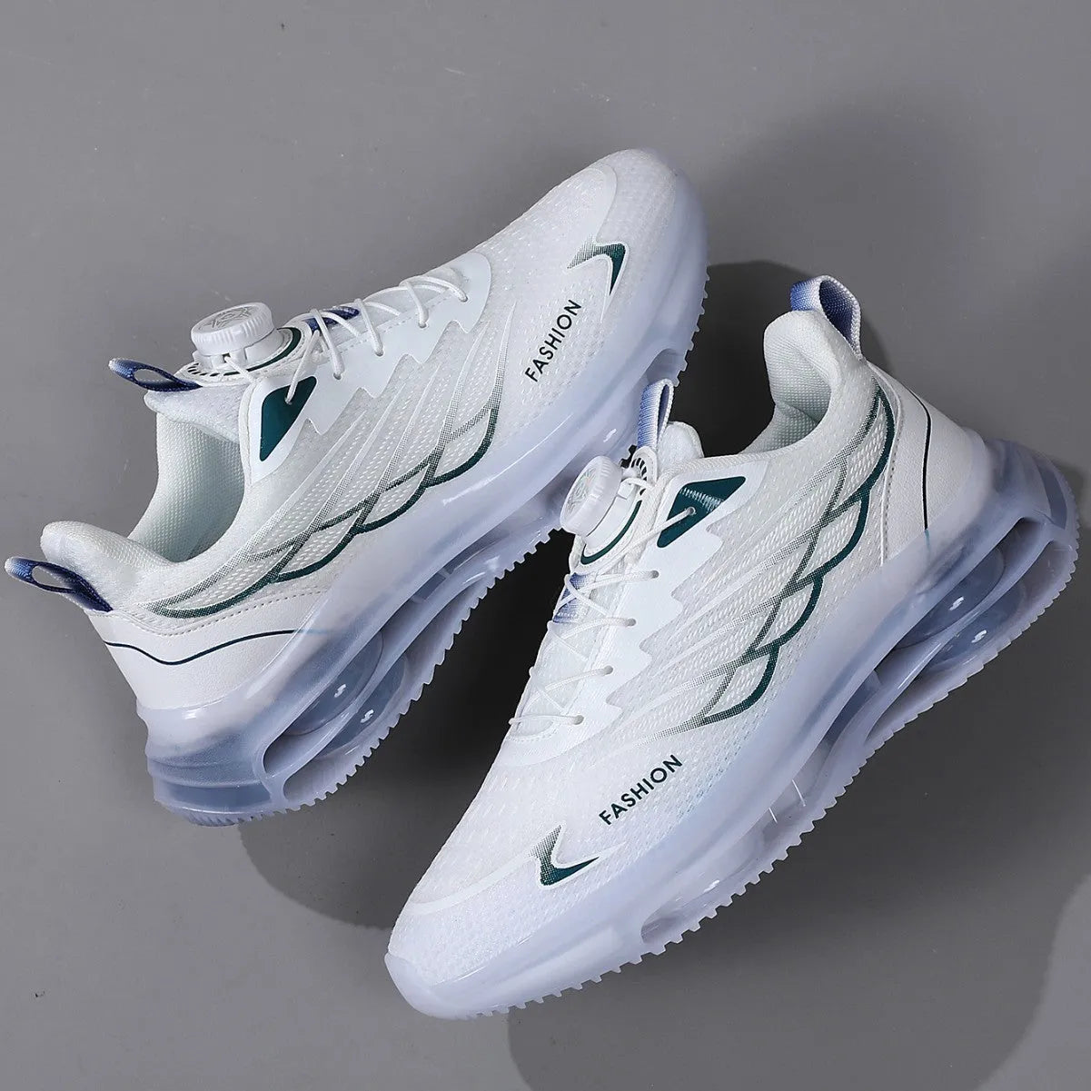 White mesh casual trainers with rotating button lacing system and rubber sole