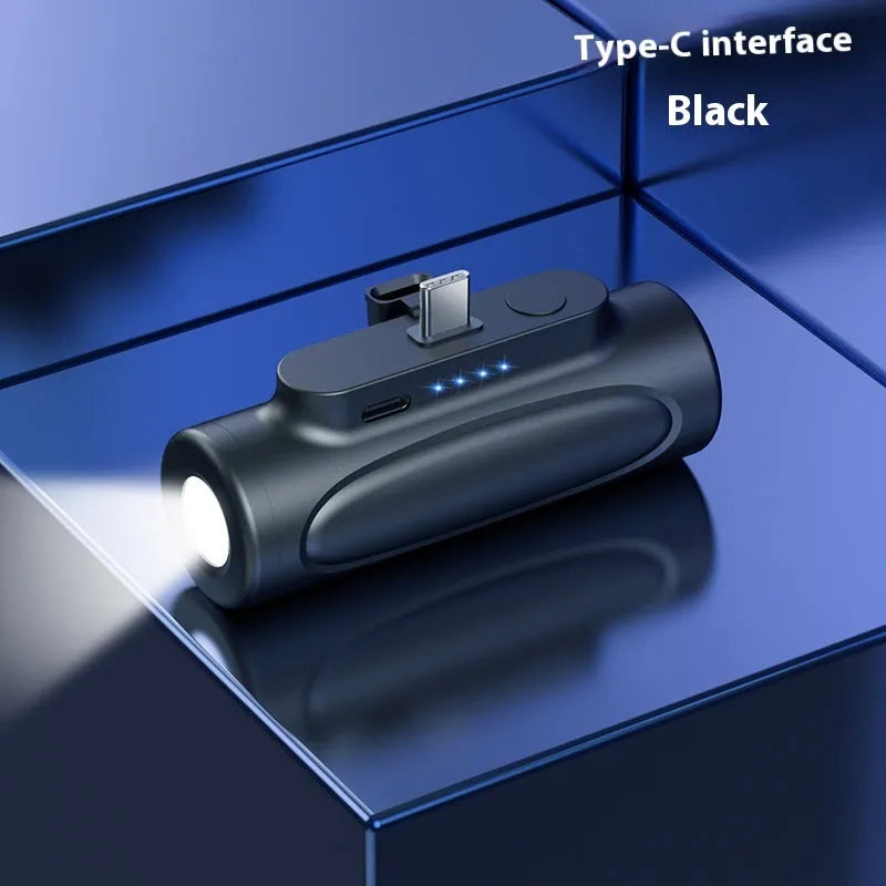 Black creative power bank with LED flashlight showing Type-C port and compact 83x27x41mm dimensions
