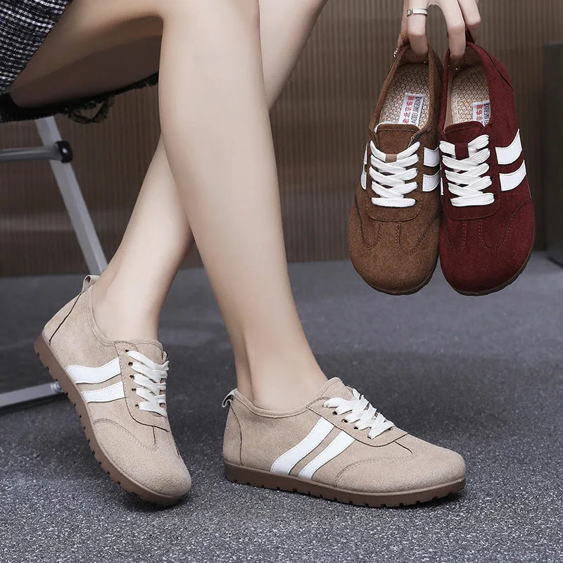 Women's vintage canvas sneakers with round toe and flat heel in dark red colour