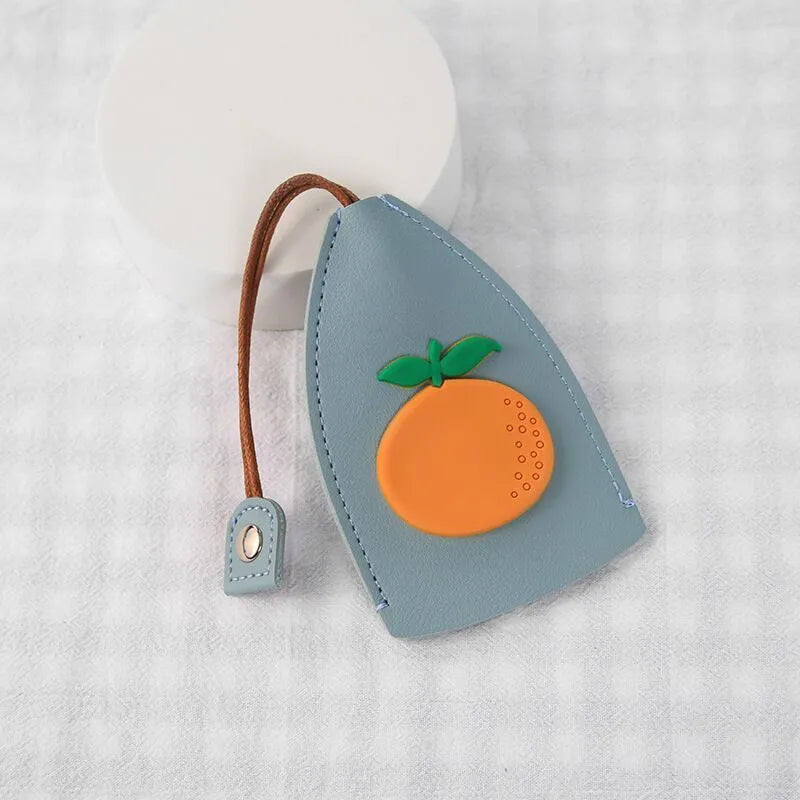Cartoon design pull-out car key case made from soft PU leather, showing approximate size.