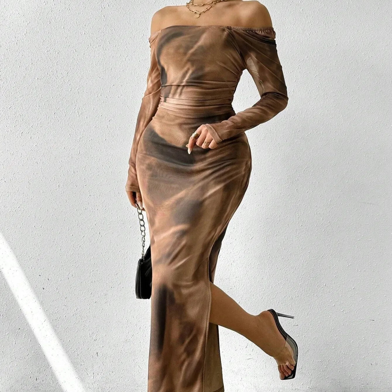 Womens long printed mesh fishtail dress with gradient colour pleating and split skirt detail
