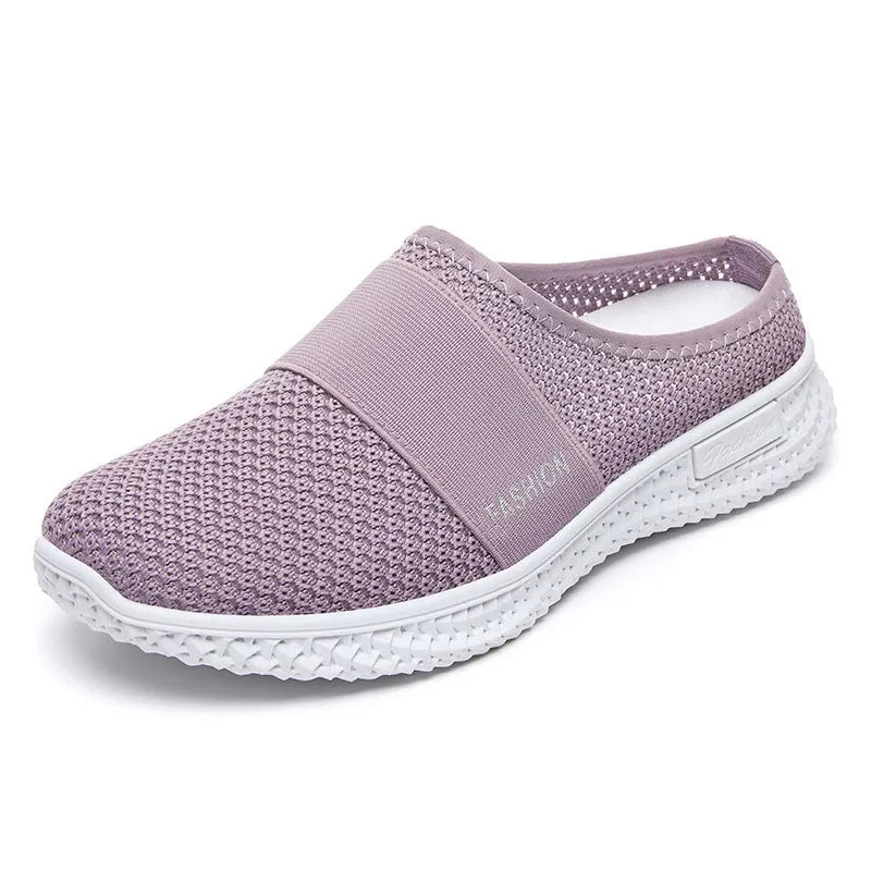 Women's casual shoes with mesh upper and hollow out detailing in round toe shape with flat heel