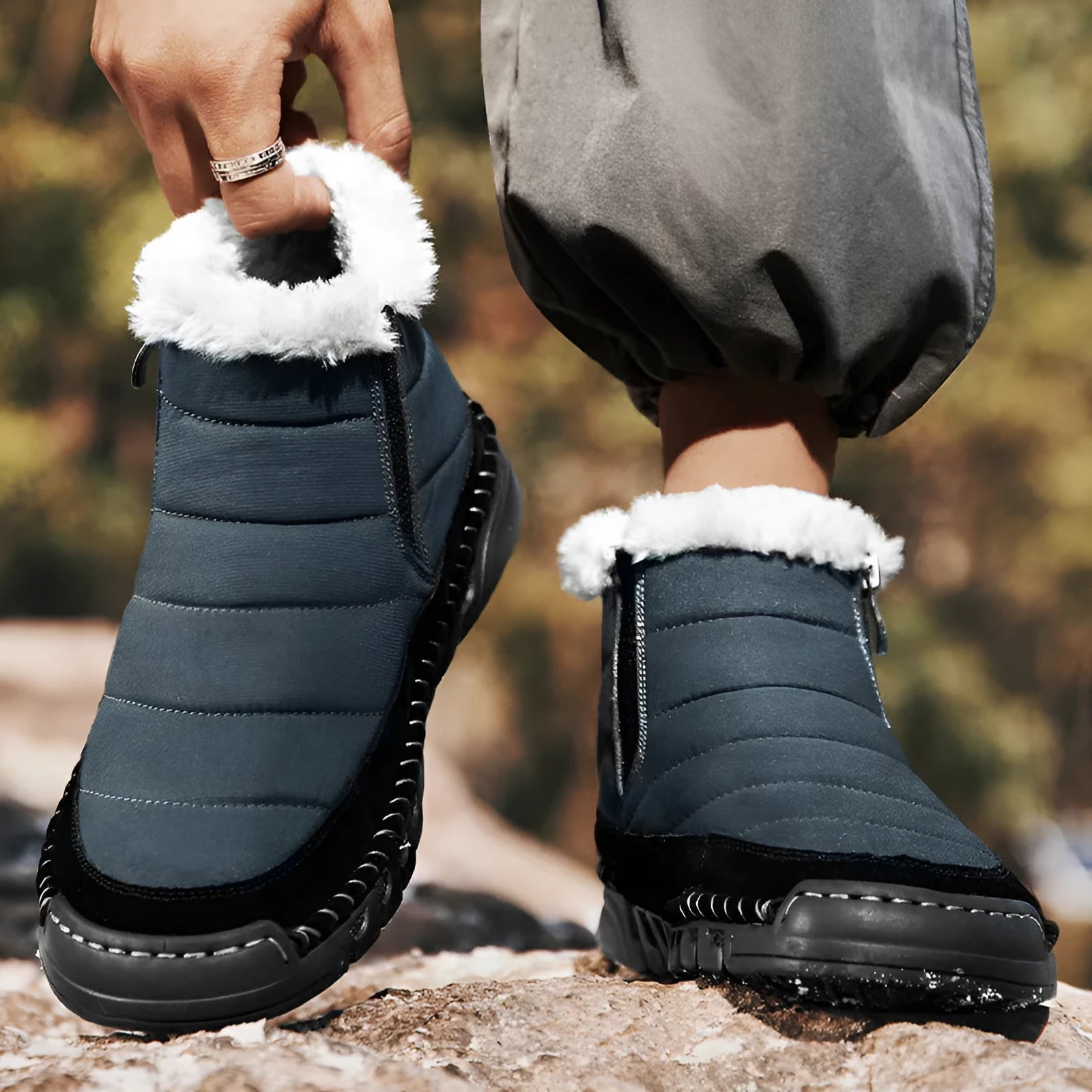 Men's plus size snow boot in blue with round toe and flat heel on a non-slip rubber sole.