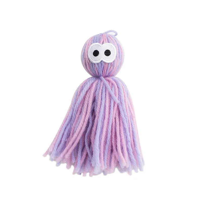 Bite-resistant wool ball cat toy with hanging loop in blue-grey colour option for teething relief