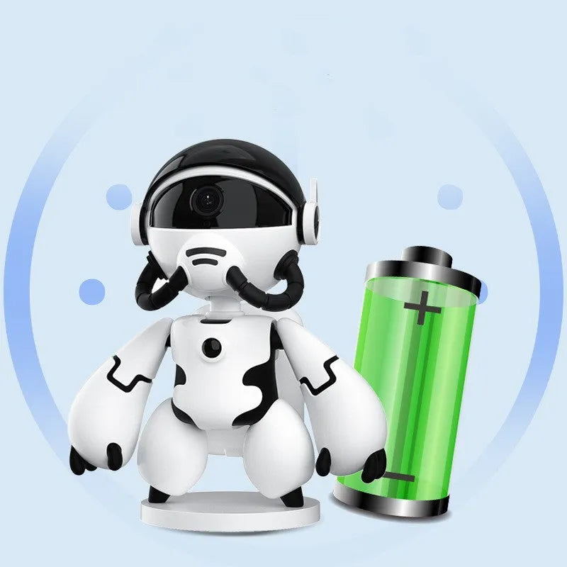 White or black wireless indoor security camera with a detachable base, shown on a shelf for home monitoring.