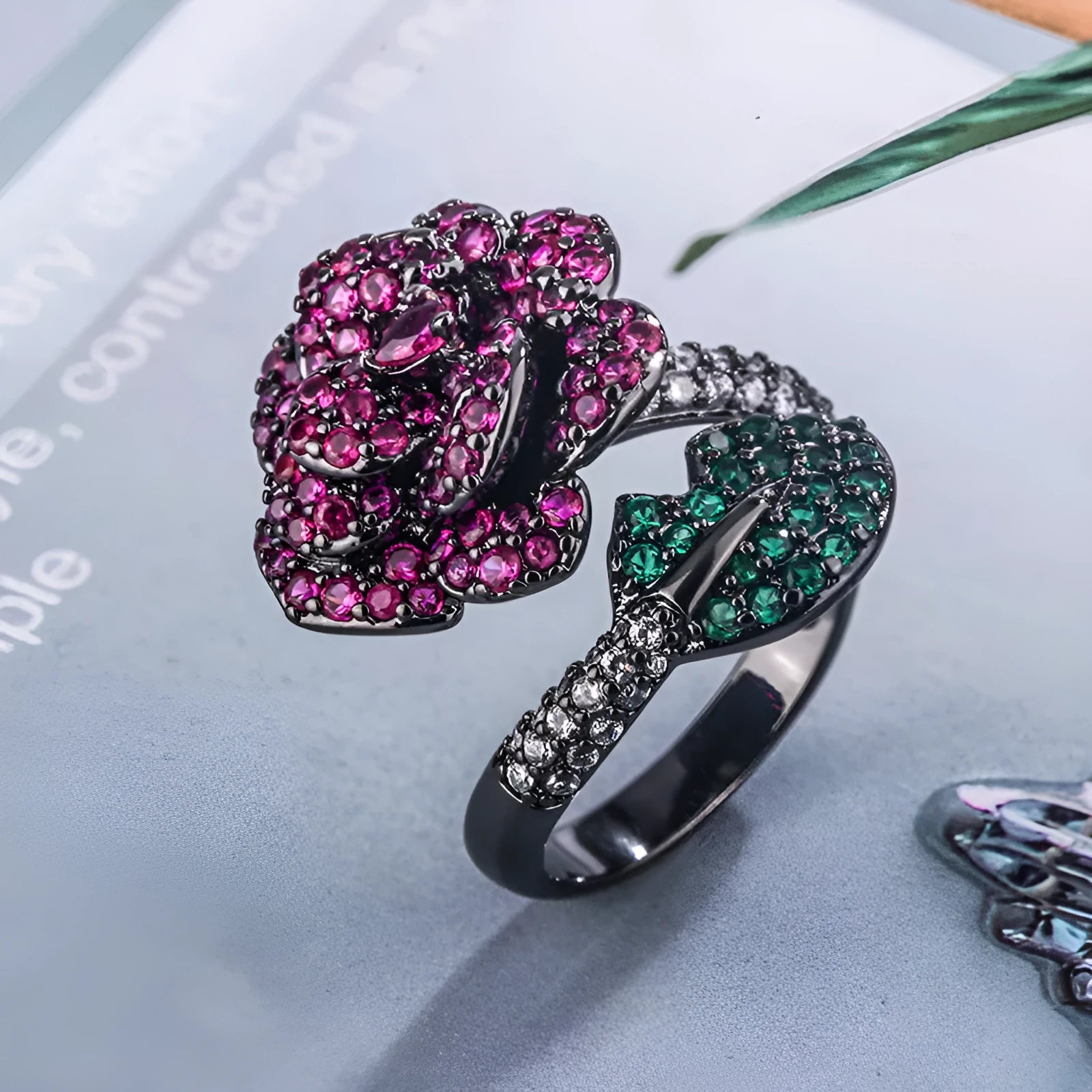 Black gold geometric flower ring with red simulation corundum stones
