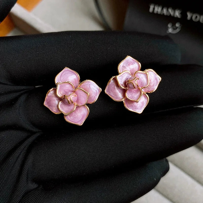 Gold-plated purple oil-spot glaze flower stud earrings with floral design on copper base