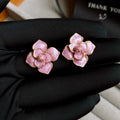 Gold-plated purple oil-spot glaze flower stud earrings with floral design on copper base