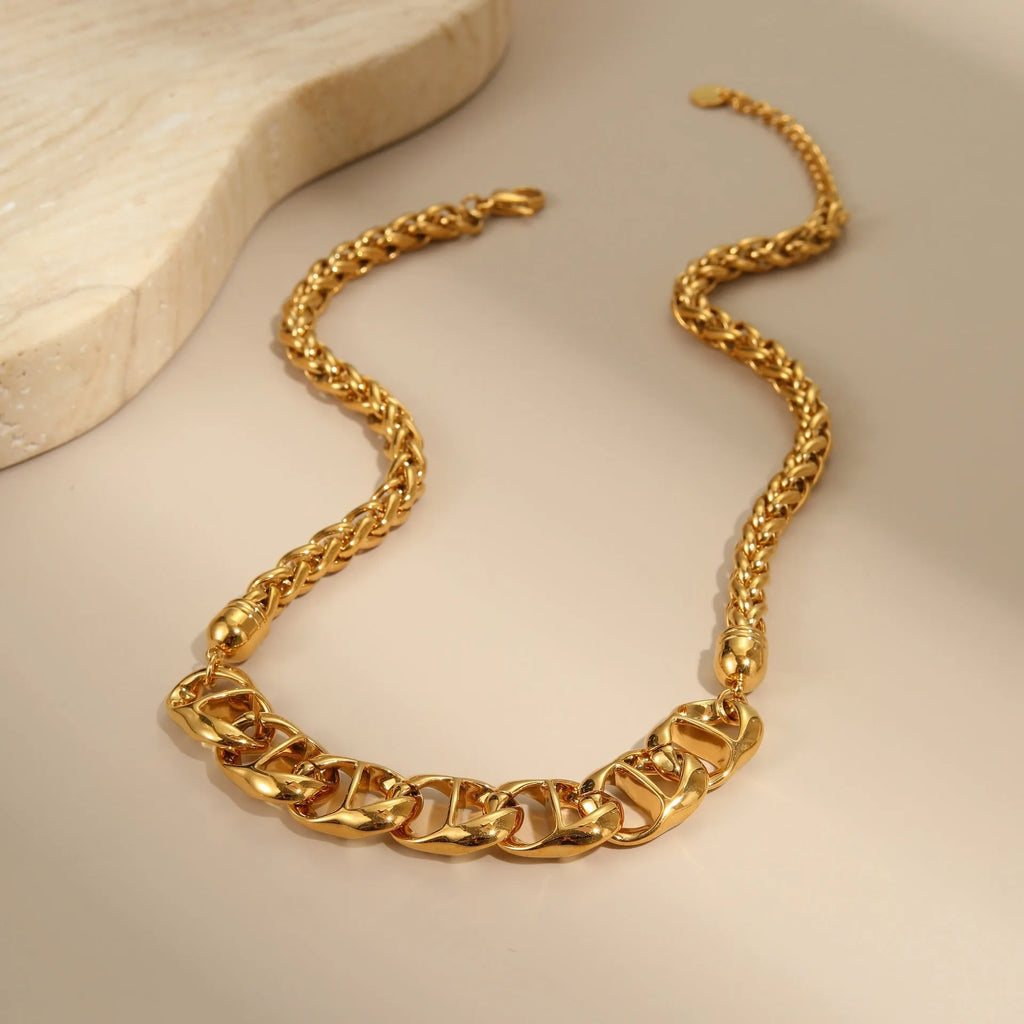 Stainless steel geometric pendant necklace with gold plating on regular chain