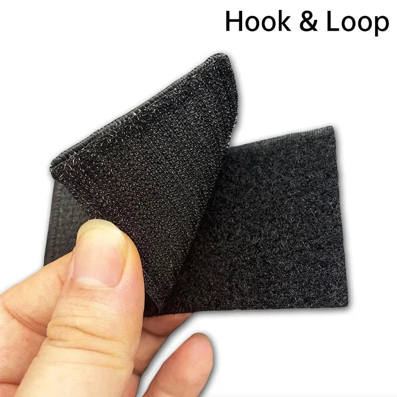 Outdoor embroidered fabric badge with Velcro strip backing on a green clover design.