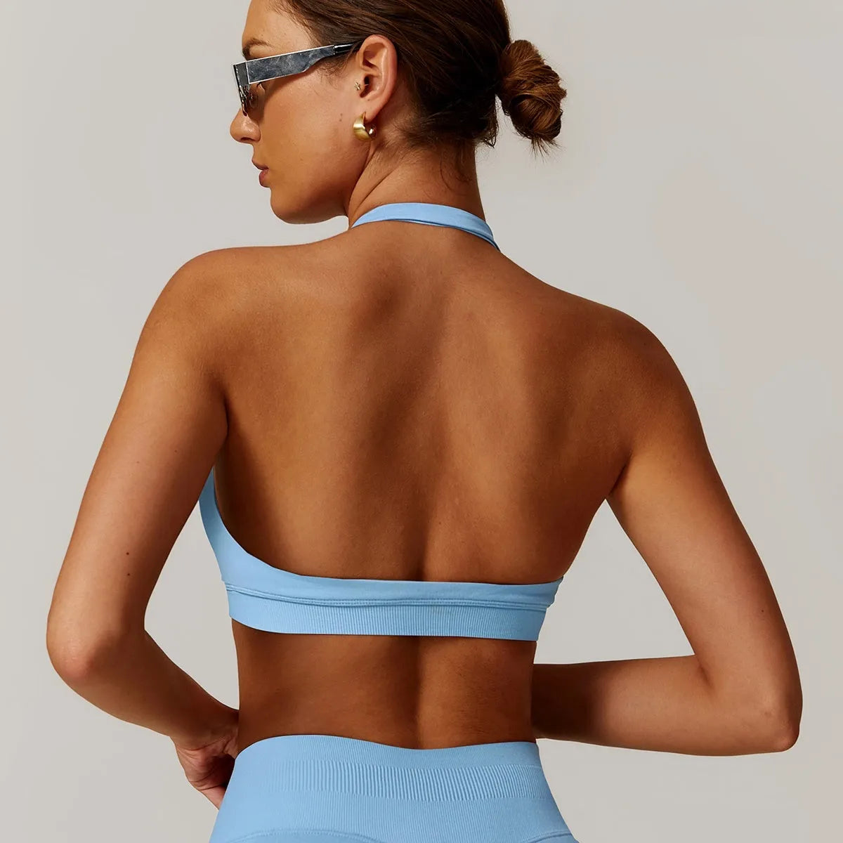 Women's halter style yoga sports bra in various colours with removable chest pads