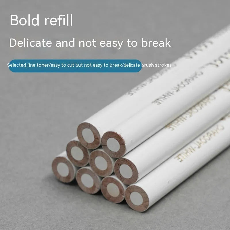 Three white charcoal pencils with wooden casings for drawing on dark paper