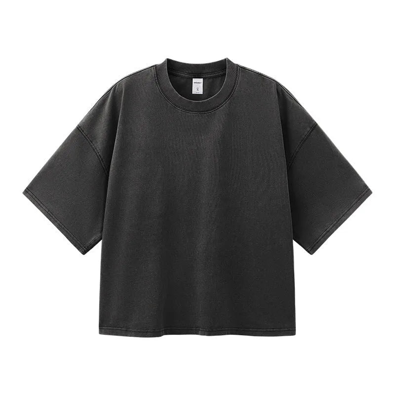 Men's cotton washed-out vintage t-shirt in khaki light showing drop-shoulder sleeve and loose fit