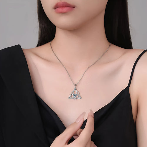 Geometric Celtic knot pendant necklace for women in electroplated copper, showing colour options.