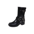 Black and brown women's platform boots with buckle details on the calf.