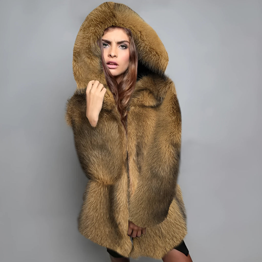 Silver grey loose mid-length artificial fur coat for women on a hanger.