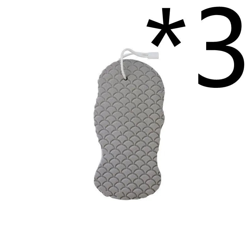 White 3D fish scale pattern bath sponge ball on a bathroom surface