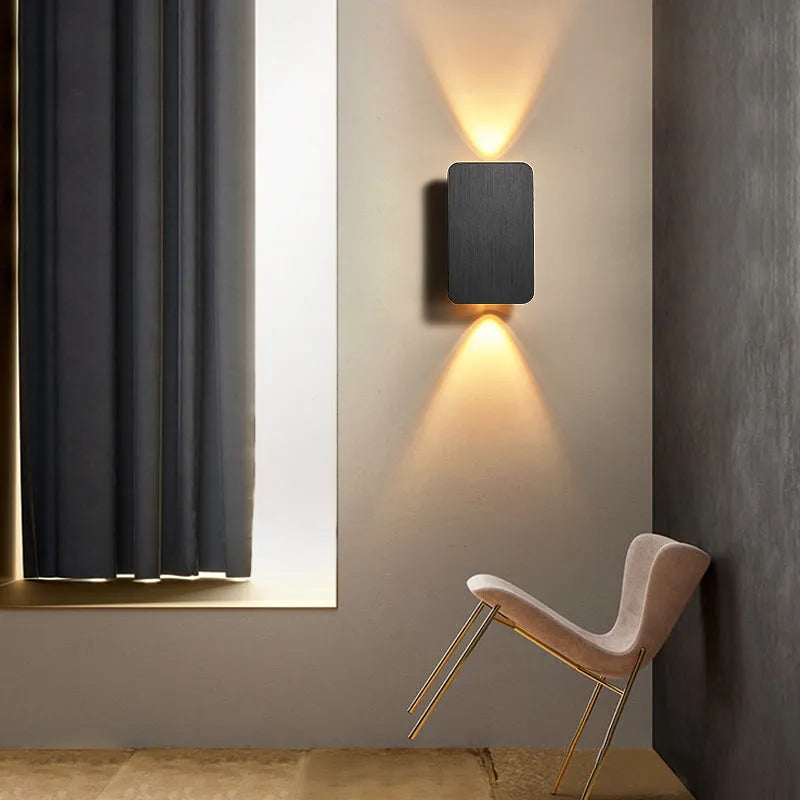 Modern minimalist LED wall lamp in black finish with three light colour options