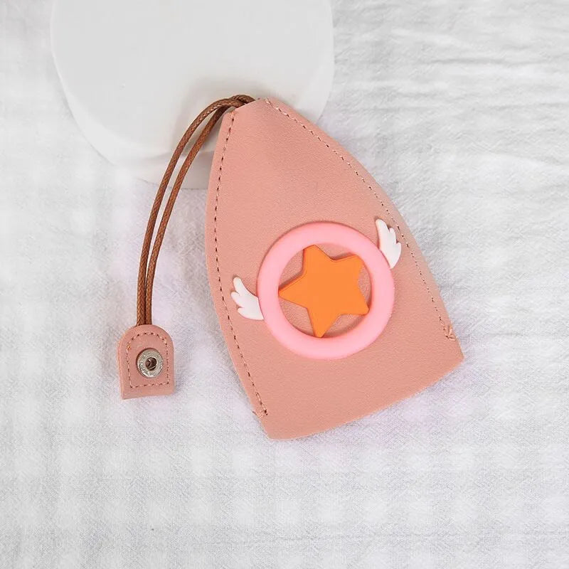 Cartoon design pull-out car key case made from soft PU leather, showing approximate size.