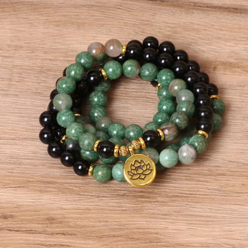 Green and black elastic beaded long bracelet with alloy components