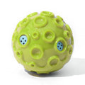 Durable dog chew toy ball with textured surface for teeth cleaning and anxiety relief
