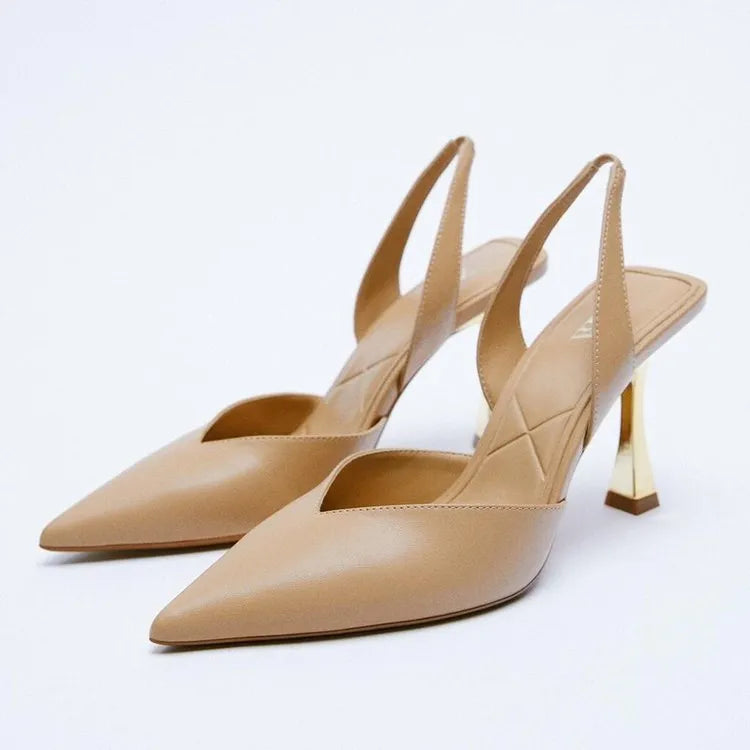 Women's nude patent leather high heels with pointed toe and shallow mouth design in apricot colour