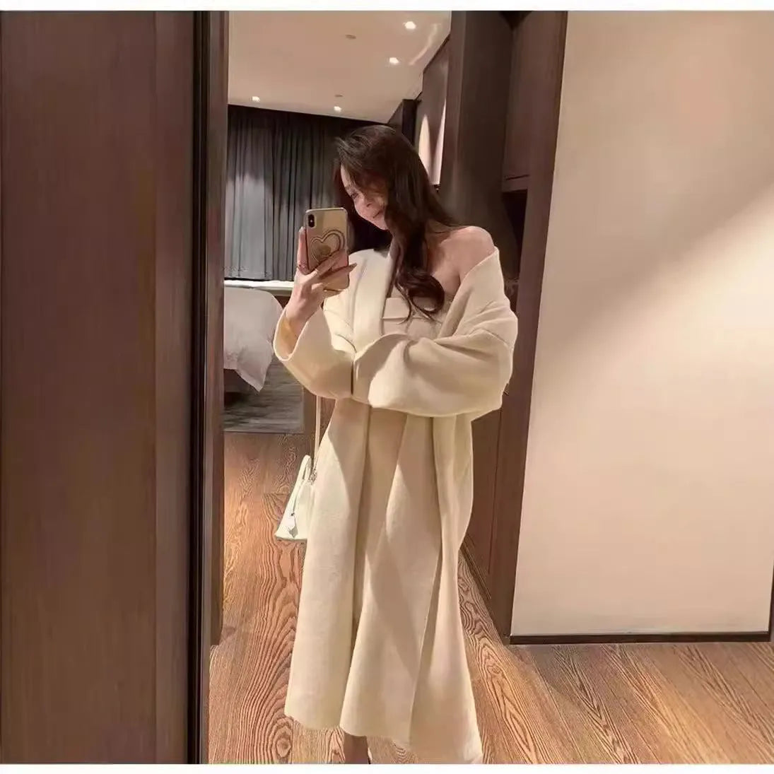 Women's grey knitted cardigan dress sweater suit two piece set with long skirt and regular sleeves.