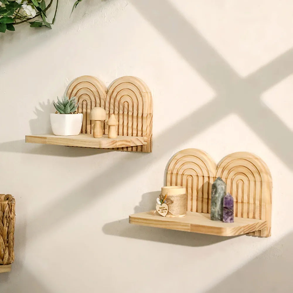 Wooden multi-layer wall rack displaying potted plants in home setting