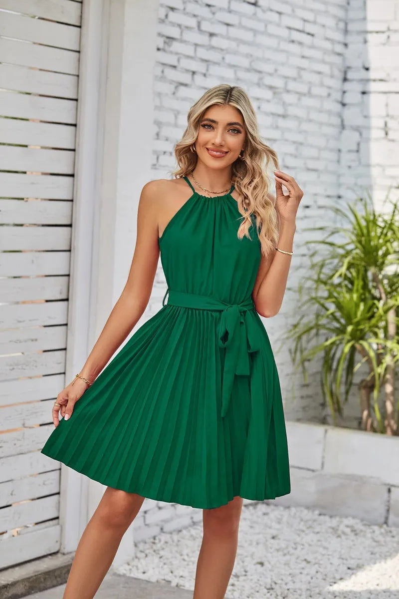 Women's black halter neck strapless dress with pleated midi skirt and adjustable waist belt