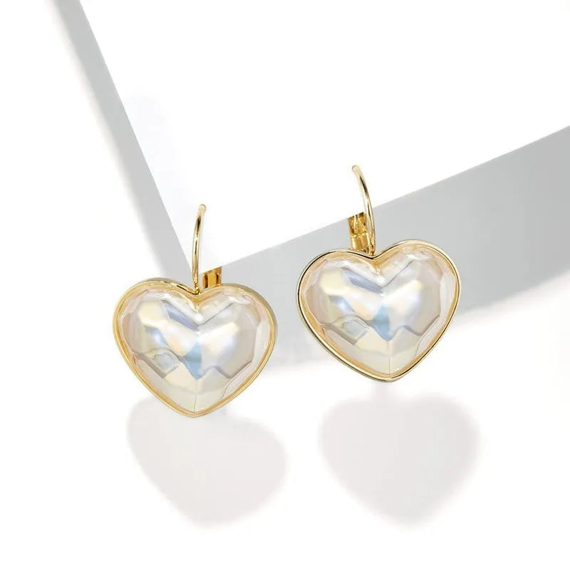 Gold alloy clip-on earrings with natural styling for women's summer fashion