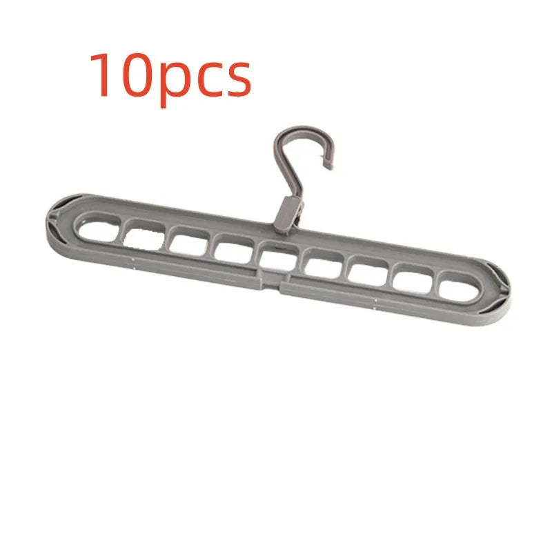 A plastic nine-hole seamless folding hanger for trousers, shown in one of five available colours.
