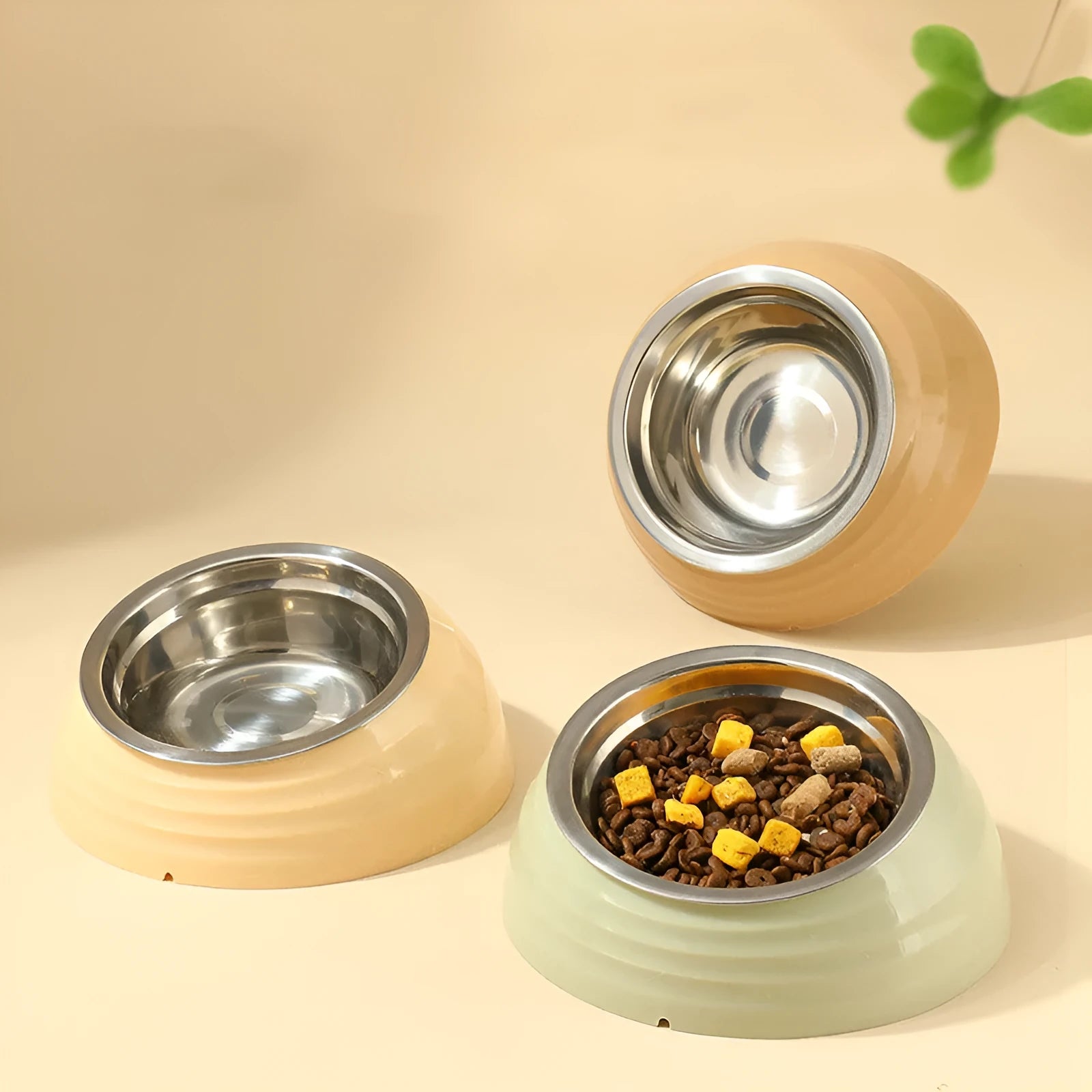 Stainless steel cat bowl with plastic base in beige, brown or light green colour